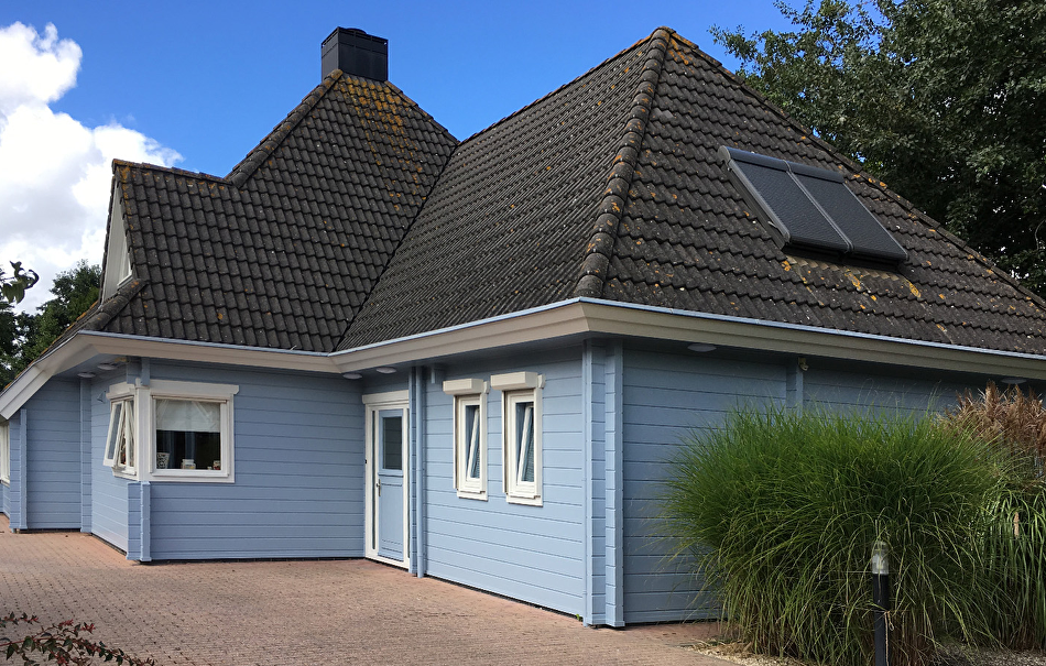 Metamorfose houten logwoning