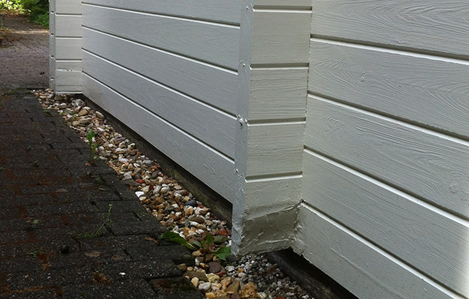 Reparatie houtrot aan logwoning
