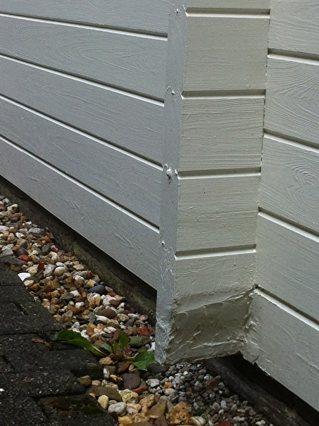 Reparatie houtrot aan logwoning